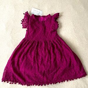 Fuschia lace girls dress.